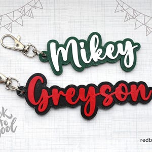 Gepersonaliseerde sleutelhanger met naamplaatje: op maat gemaakt accessoire voor rugzakwaterfles