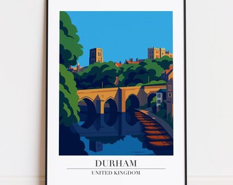 May include: A framed art print of Durham, UK, showing a stylized illustration of a bridge over a river. The artwork features buildings and trees under a blue sky. The word "DURHAM" is printed at the bottom, with "UNITED KINGDOM" below.