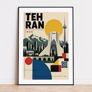 May include: A framed travel poster featuring a stylized illustration of Tehran, Iran. The design includes the Azadi Tower, the Milad Tower, and the Alborz mountains in a palette of cream, black, blue, red, and yellow, with the text TEHRAN AT THE FOOT OF THE ALBORZ IRAN.