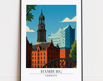 Op de afbeelding: Een ingelijste kunstdruk met een gestileerde illustratie van Hamburg, Duitsland. Het kunstwerk toont de Elbphilharmonie concertzaal, een klokkentoren en een brug, tegen een blauwe lucht. De tekst "HAMBURG DUITSLAND" staat onderaan.