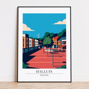 May include: A framed art print featuring a stylized illustration of Halluin, France. The artwork depicts buildings, trees, and a windmill under a blue sky with clouds. The text "HALLUIN FRANCE" is at the bottom.