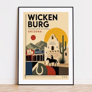 May include: A framed travel poster for Wickenburg, Arizona, featuring a desert landscape with a mission-style building, a cactus, a person on horseback with a lasso, a saloon, and a horseshoe, all rendered in a flat, graphic illustration style.