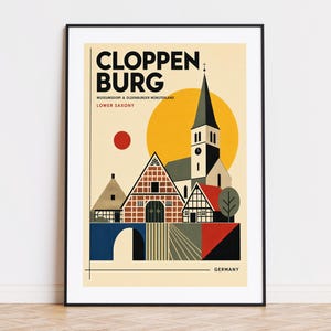 Könnte beinhalten: Ein gerahmtes Reiseplakat mit dem Text CLOPPENBURG, MUSEUMSDORF & OLDENBURGER MÜNSTERLAND, LOWER SAXONY und GERMANY. Die grafische Illustration zeigt einen Kirchturm, Fachwerkhäuser, eine gelbe Sonne und einen roten Kreis.