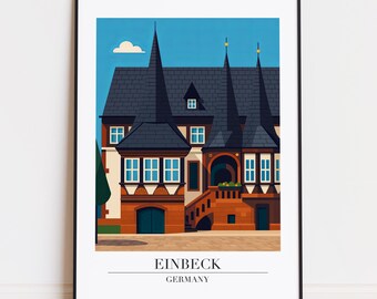 Könnte beinhalten: Ein gerahmter Kunstdruck mit einer stilisierten Illustration eines Gebäudes in Einbeck, Deutschland. Das Kunstwerk zeigt ein Gebäude mit einem dunkelblauen Dach, mehreren Türmen und einer Backsteinfassade. Der Text "EINBECK GERMANY" ist unten aufgedruckt.