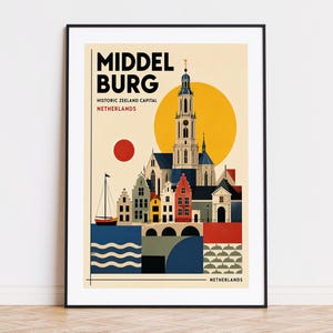 May include: A framed travel poster of Middelburg, Netherlands, featuring a stylized cityscape with a tall church tower, colorful buildings, a sailboat, and a large yellow sun. The text reads MIDDEL BURG, HISTORIC ZEELAND CAPITAL, NETHERLANDS.