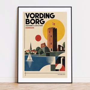 May include: A framed travel poster featuring Vordingborg, Denmark, with the text VORDING BORG, GÅSETÅRNET & CASTLE RUINS, DENMARK. The illustration depicts a brick tower, castle ruins, a sailboat on blue water, a white swan, and a yellow sun.