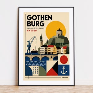 以下が含まれることがあります： スウェーデン、ヨーテボリのイラストが描かれた額入りのアートプリント。港の風景、クレーン、建物、橋、大きな黄色い太陽が特徴です。黒いフレームに入っています。