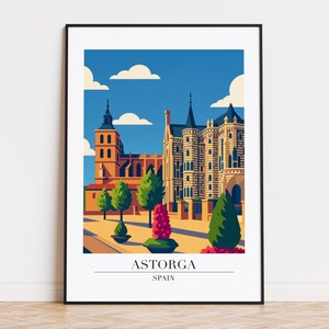 May include: A framed art print featuring a stylized illustration of the Astorga Cathedral in Spain. The artwork showcases the building's architecture with a blue sky background and the text "ASTORGA SPAIN" at the bottom.