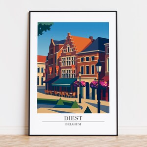 May include: A framed art print featuring a stylized illustration of a European town square. The artwork showcases buildings with red and brown facades, a blue awning, and the text "DIEST BELGIUM" at the bottom.