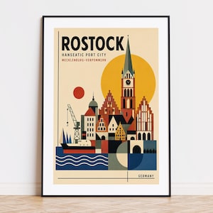 May include: A framed travel poster of Rostock, Germany, featuring a stylised cityscape with a tall church spire, gabled buildings, a harbour crane, and a ship. The text reads ROSTOCK, HANSEATIC PORT CITY, MECKLENBURG-VORPOMMERN, and GERMANY.
