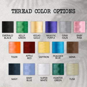 May include: Image displaying a variety of thread color options. The text "THREAD COLOR OPTIONS" is at the top. Colors include Emerald Black, Kelly Green, Vegas Gold, Majestic Purple, Gray Haze, Baby Pink, Tiger, Apple Red, Saffron, Peacock Blue, Sienna, Navy, Baby Blue, Super White, Hunter Green, and Tusk.