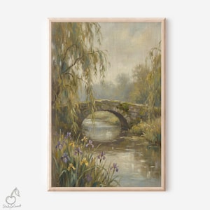 May include: A framed landscape painting depicts a stone bridge arching over a calm river. The artwork features weeping willow trees, colorful flowers, and a soft, muted color palette. The overall theme is a serene, natural scene.