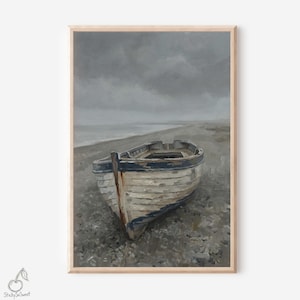 May include: A framed print of a weathered rowboat on a gray beach under a cloudy sky. The boat is painted in shades of white, blue, and brown, with visible wear and tear. The artwork evokes a sense of nostalgia and the sea.