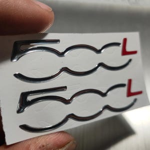 Coppia adesivi resinati 3D logo fiat 500 L