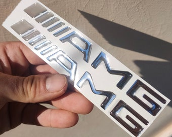 Pair of 3D resin stickers with AMG logo