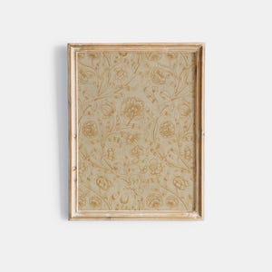 May include: A light wood frame with a beige background and a gold floral pattern.