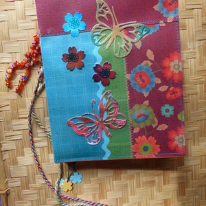 Journal. Small size. Large in content. Nature themed. Lots of pages. Lots of fun goodies.