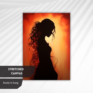 May include: A black silhouette of a woman with long, curly hair standing in front of a fiery orange and yellow background.
