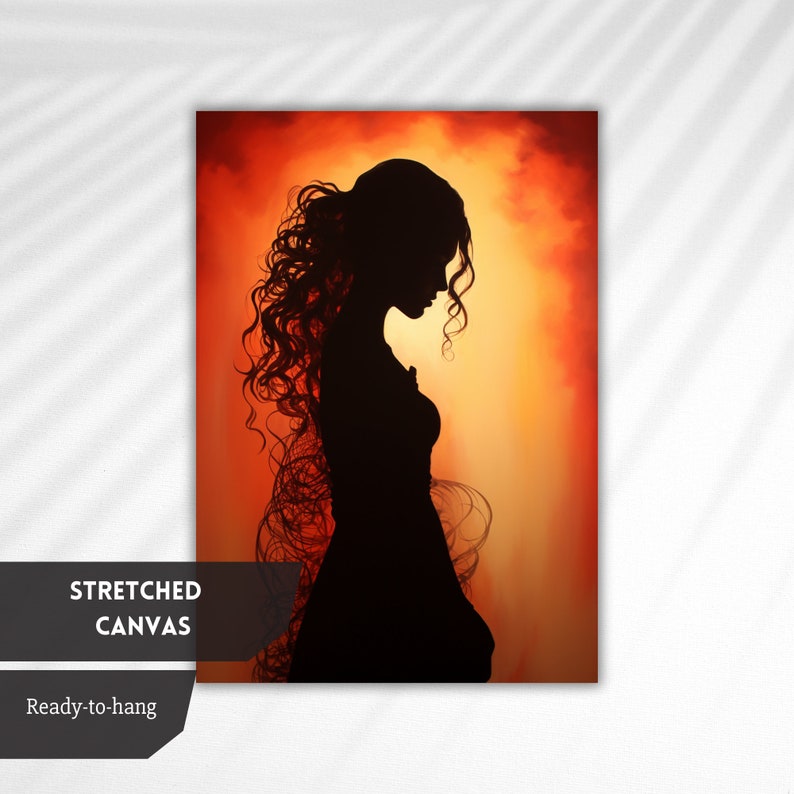 May include: A black silhouette of a woman with long, curly hair standing in front of a fiery orange and yellow background.