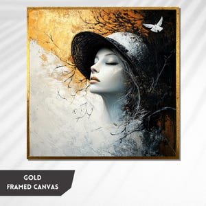 Puede incluir: Una pintura sobre lienzo enmarcada de una mujer con los ojos cerrados, que lleva un sombrero negro con un ala blanca. El fondo es una mezcla de dorado, blanco y negro con un pájaro blanco volando en la esquina superior derecha.