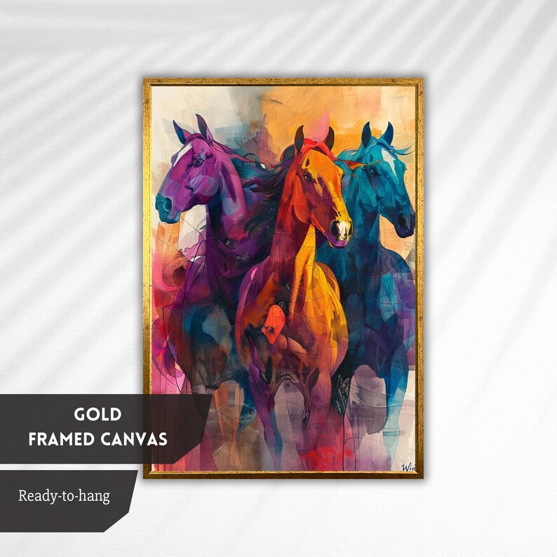 May include: Abstract painting of three horses running, with a purple, orange, and blue colour scheme. The painting is framed in gold and ready to hang.