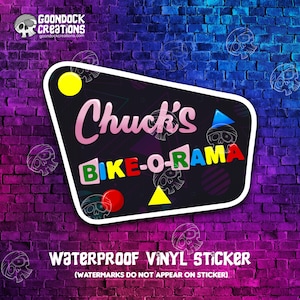 May include: A colorful sticker with the text "Chuck's Bike-O-Rama" in a retro style. The sticker is on a brick wall background and has a waterproof vinyl finish.