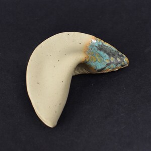 Handmade ceramic fortune cookie #173