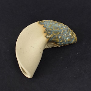 Handmade ceramic fortune cookie #177