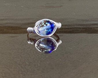 Wire wrapped glass ring (glows in the dark)