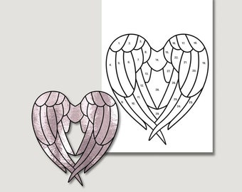 May include: A stained glass pattern of angel wings in the shape of a heart. The pattern is numbered for easy assembly. The image also shows a completed version of the pattern with a pink and silver color scheme.