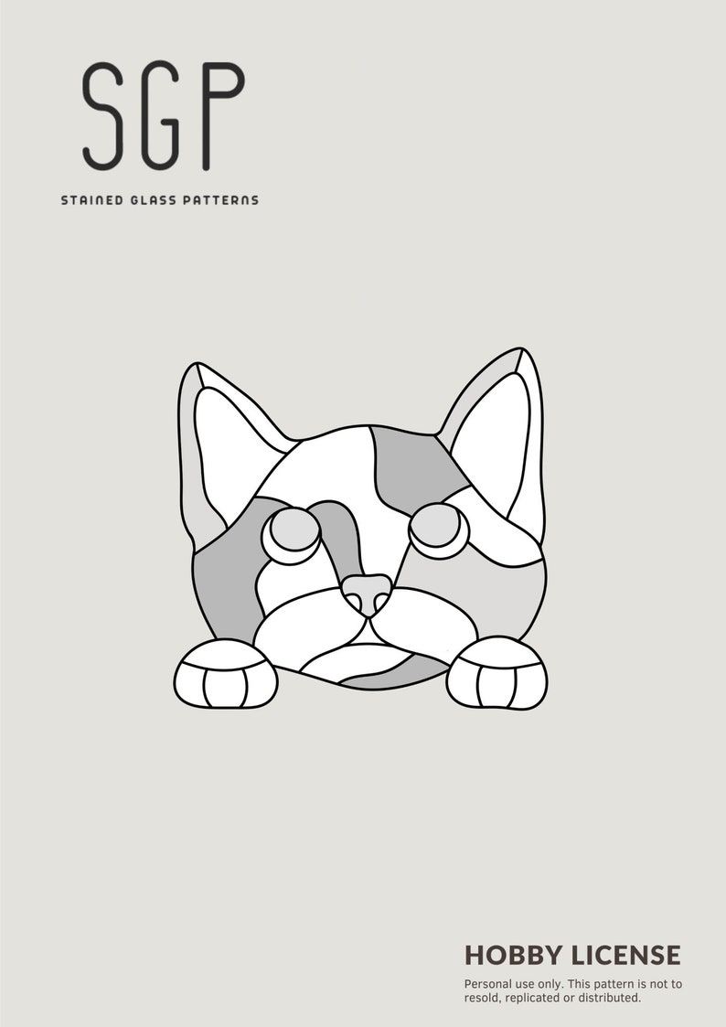 May include: A stained glass pattern featuring a cat's face in shades of gray and white, with black outlines. The image includes the text "SGP STAINED GLASS PATTERNS" and "HOBBY LICENSE".