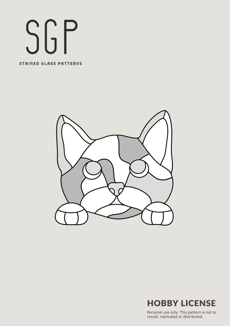 May include: A stained glass pattern featuring a stylized cat face in shades of gray and white, outlined in black. The image includes the text "SGP STAINED GLASS PATTERNS" and "HOBBY LICENSE".