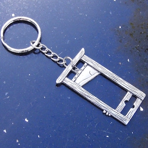 Silver French knife guillotine keychain