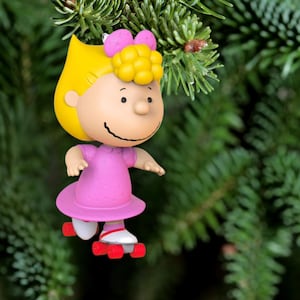 Décoration Hallmark The Peanuts® pour le patinage en groupe
