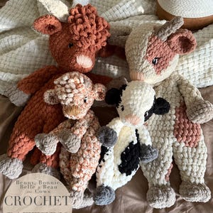 May include: Crochet pattern for four plush cow toys. The cows are brown, white, and black with a textured, fuzzy appearance. The pattern is titled "Benny, Bonnie, Belle & Beau the Cows Crochet Pattern" and includes the text "PDF English".