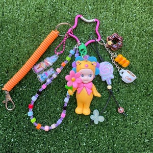 Cute Sonny Angel flower gift (not authentic) | bag charms | phone charms | keychain |