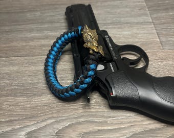 Handmade Paracord Bracelet: Military Grade Nylon with Brass Wolf Shackle