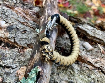 Handmade Stitched Paracord Bracelet: Brass Viking Skull Bead, Shackle Closure