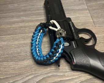Handmade Stitched Paracord Bracelet: Skull Bead, Woven Shackle Closure
