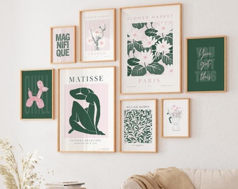May include: A gallery wall with nine framed prints featuring various designs, including floral patterns, abstract figures, and text-based art. The prints are in a mix of green, pink, and white colours.