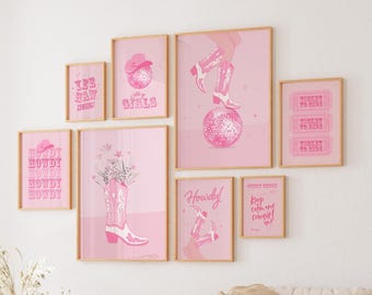 May include: Pink and white framed wall art prints with various designs, including a cowboy boot with flowers, a disco ball, and the text "Howdy!" and "Yee Haw! Cowgirls!"