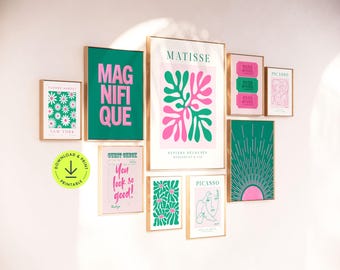 May include: A collection of eight framed prints in a green and pink colour scheme. The prints feature various designs, including abstract shapes, flowers, and text. The text on the prints includes "MAGNIFIQUE", "GUEST CHECK", "You look so good!", "MATISSE", "PAPIERS DÉCOUPÉS", "GOOD WEEKEND", "PICASSO", and "FLOWER MARKET NEW YORK".