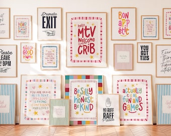 May include: A collection of framed wall art prints featuring various typographic designs, colorful borders, and motivational phrases such as Hello MTV Welcome to My Crib, Be Silly Be Honest Be Kind, and Actually It Is All Fun and Games.