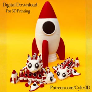 May include: A white and red rocket and several white and red dragon-like creatures are displayed against a yellow background. The rocket has a black circular window. The text "Digital Download For 3D Printing" is at the top. The website "Patreon.com/Cylix3D" is at the bottom.