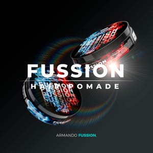 May include: Two black hair pomade containers with the word "FUSSION" in large white letters. The containers have a red and blue design. The text "HAIR POMADE" is also visible. The brand name "Armando Fussion" is at the bottom.