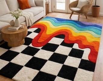 May include: A colorful area rug with a black and white checkered pattern and a rainbow design. The rainbow flows across the rug, adding a vibrant touch to the room. The rug is a statement piece.
