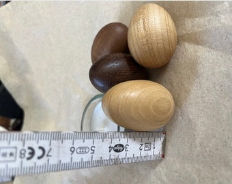 turned wooden eggs