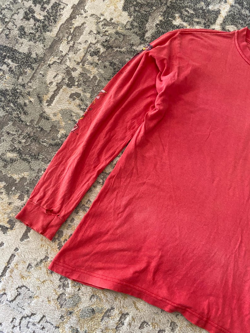 May include: A set of three ceramic nesting bowls in shades of blue, green, and white. The bowls feature a speckled glaze and a simple, modern design. The largest bowl measures approximately 6 inches in diameter.