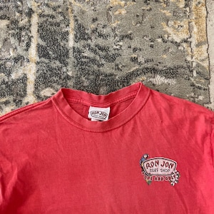 May include: A rustic wooden sign with the text "Welcome to our home" in a handwritten style. The sign is rectangular, with a distressed finish, and features a simple, inviting design. It's suitable for indoor or outdoor use.