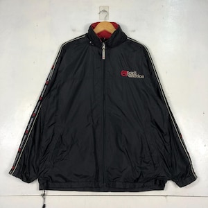 May include: Black zippered jacket with red and white trim and the text "ecko unltd" on the front.